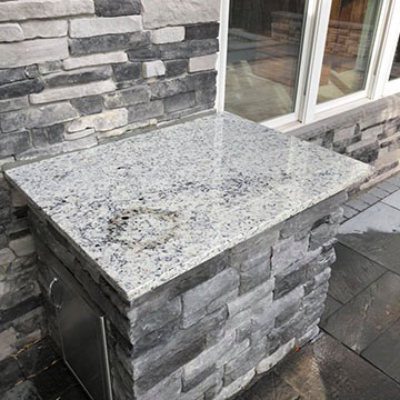 Outdoor Kitchen Counter installed by Granite Works