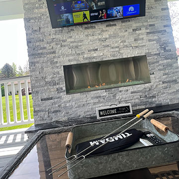 Outdoor Fireplace fabricated and installed by Granite Works